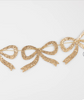 Meri Meri Gold Glitter Bow Garland Meri Meri Gold Glitter Bow Garland