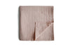 Mushie Muslin Swaddles.