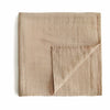 Mushie Muslin Swaddles.