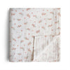 Mushie Muslin Swaddles.