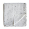 Mushie Muslin Swaddles.
